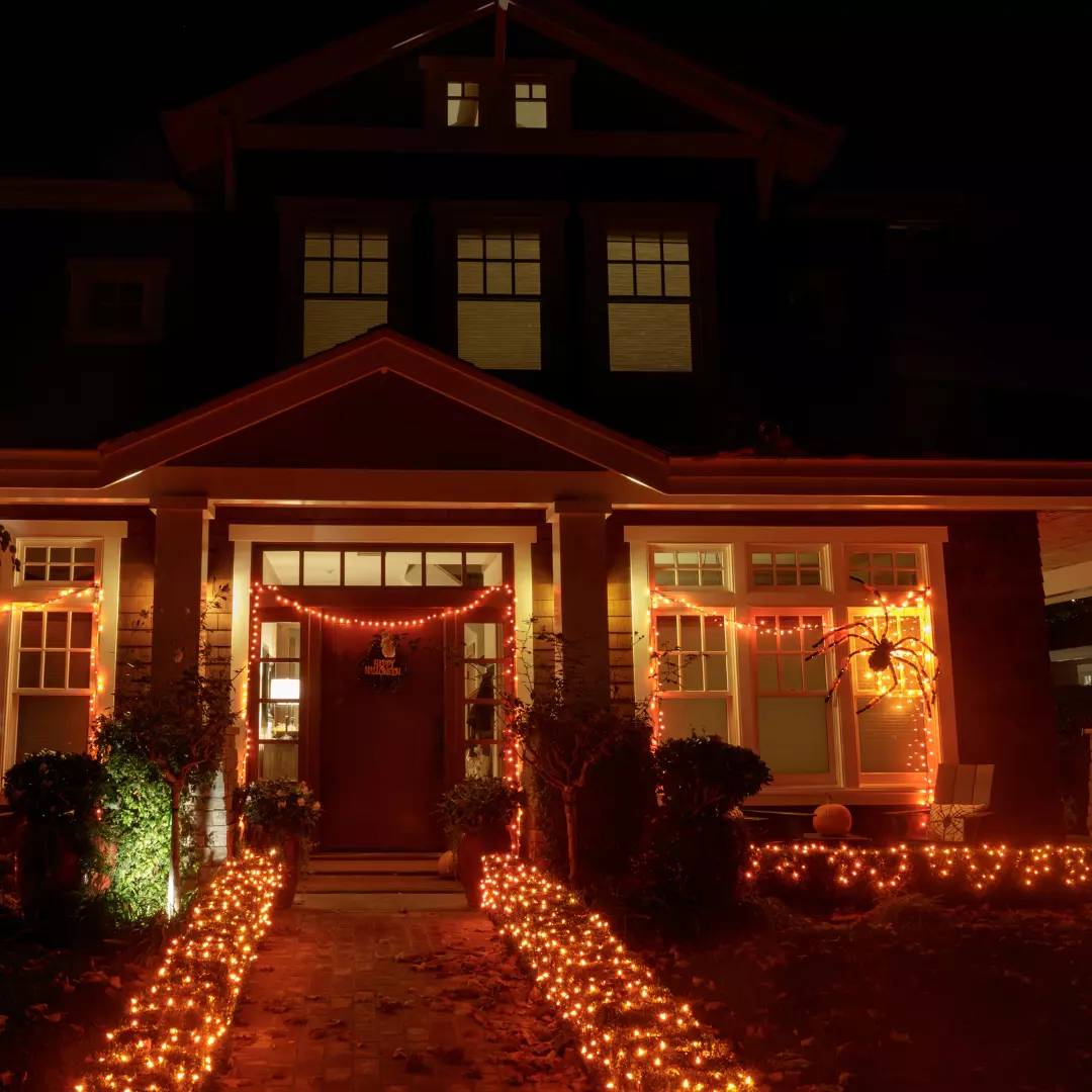 house decorated for halloween with lights